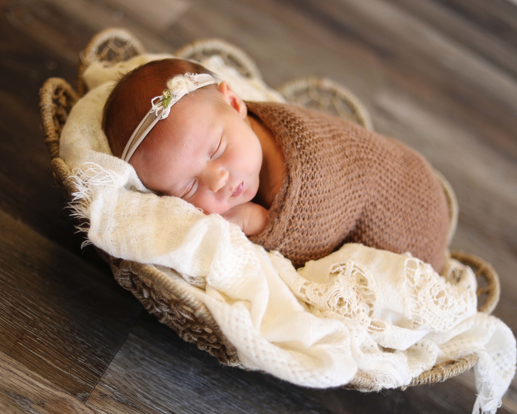 Sioux Falls Newborn Posing in Basket