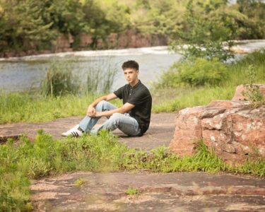 Sioux Falls Senior posing near river