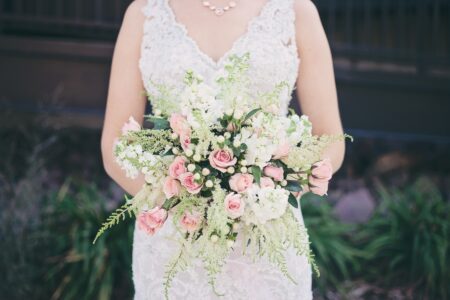 Sioux Falls Bride Posing with Flowers