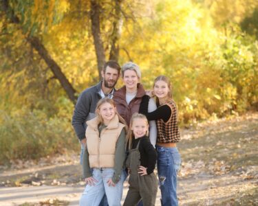 Sioux falls family posing for fall photos