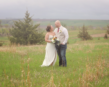 Sioux Falls Wedding Couple Posing in Field