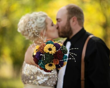 Sioux Falls Wedding Couple Posing with Flowers