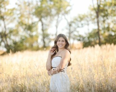 Sioux Falls Senior posing in field