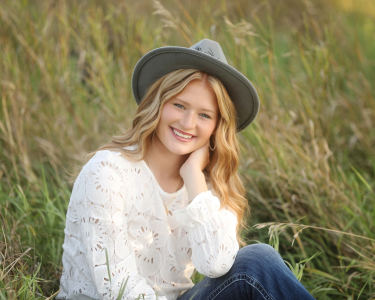 Sioux Falls Senior posing with hat