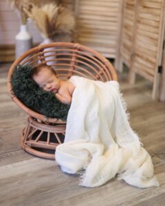 Sioux Falls Newborn Posing in Chair