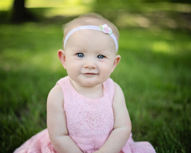 Sioux Falls Girl posing in grass
