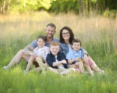 Sioux Falls Family posing in field