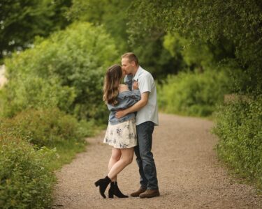 Sioux Falls Couple Kissing on Path