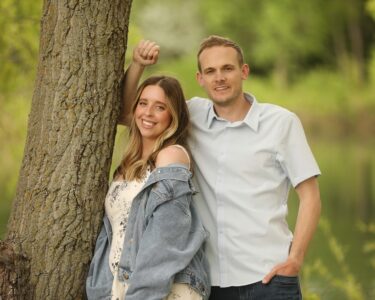 Sioux Falls Wedding Couple Posing next to tree